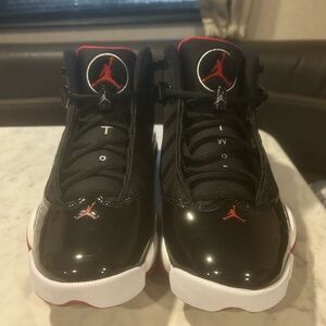Men’s Nike Jordan 6 Rings in colors black and varsity red.
